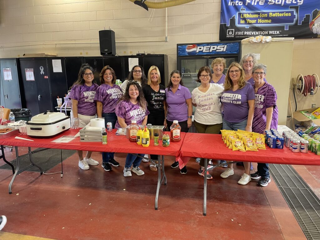 Munster Junior Woman's Club members volunteering at the 2026 Munster Fire Prevention Week Open House, serving food, drinks, and snacks.